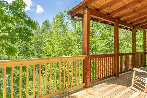 Wooded deck view at Relaxation Ridge, a 2 bedroom cabin rental located in Pigeon Forge 