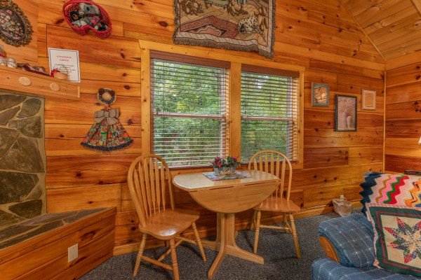 Dining table for two at Loving You, a 1 bedroom cabin rental located in Pigeon Forge
