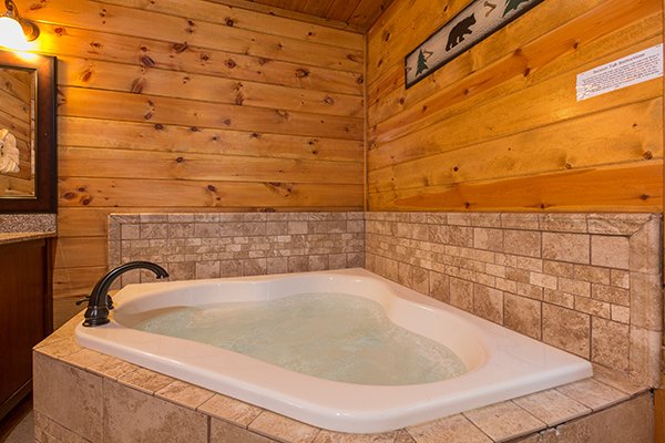 Jacuzzi in a corner at Rocky Top Lodge, a 3 bedroom cabin rental located in Pigeon Forge