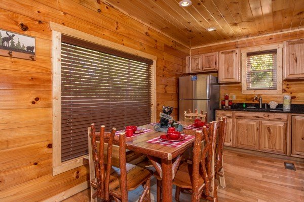Dining table at Canyon Camp Falls, a 2 bedroom cabin rental located in Pigeon Forge