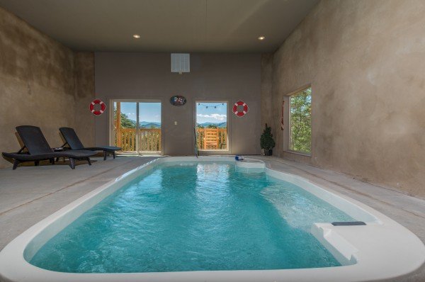 Indoor pool at Canyon Camp Falls, a 2 bedroom cabin rental located in Pigeon Forge