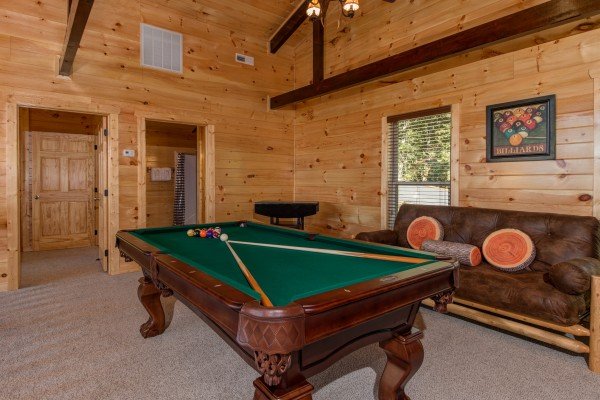 Pool table in the game room at Canyon Camp Falls, a 2 bedroom cabin rental located in Pigeon Forge