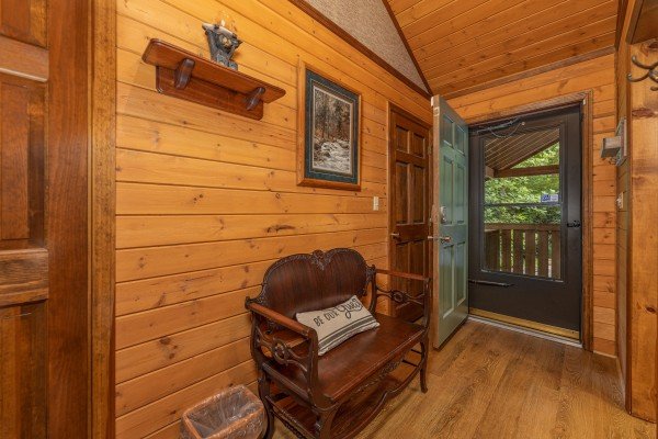 Foyer with a bench at Cubs' Crib, a 3 bedroom cabin rental located in Gatlinburg