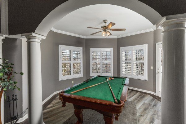 Pool table at Chalet Mignon, an 8-bedroom cabin rental located in Gatlinburg