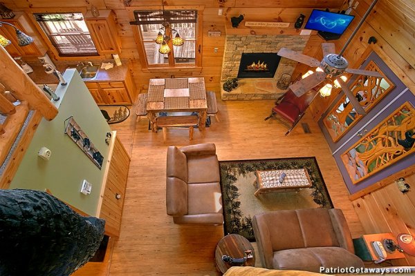 Looking down into the living room from above at Picture Perfect Hideaway, a 2 bedroom cabin rental located in Pigeon Forge