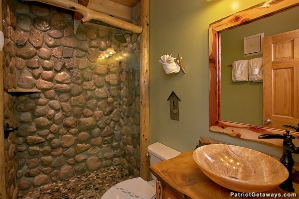 Bathroom with custom shower and sink at Picture Perfect Hideaway, a 2 bedroom cabin rental located in Pigeon Forge