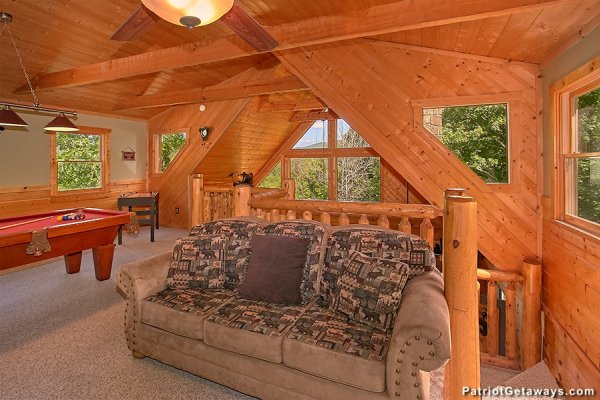 Sleeper sofa in the loft at Picture Perfect Hideaway, a 2 bedroom cabin rental located in Pigeon Forge