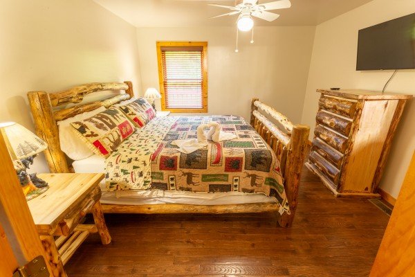 Main floor bedroom at 1 Crazy Cub, a 4 bedroom cabin rental located in Pigeon Forge