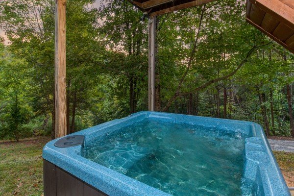 Hot tub at cabin 1 at The Settlement, a 10 bedroom cabin rental located in Pigeon Forge