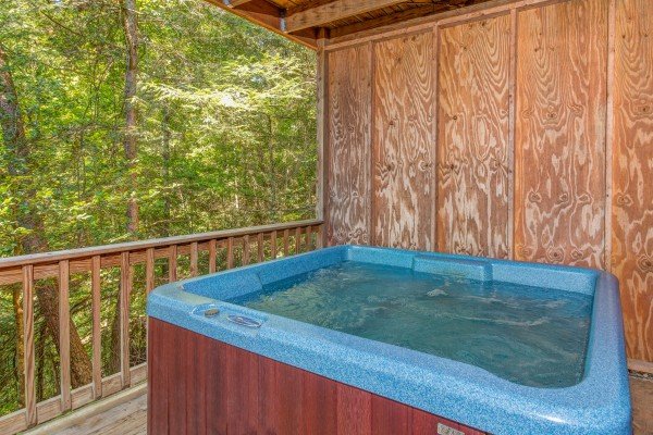 Hot tub at cabin 2 at The Settlement, a 10 bedroom cabin rental located in Pigeon Forge