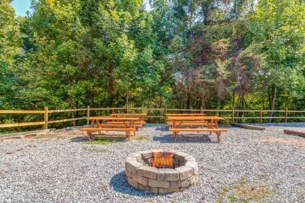 Fire pit area at The Settlement, a 10 bedroom cabin rental located in Pigeon Forge