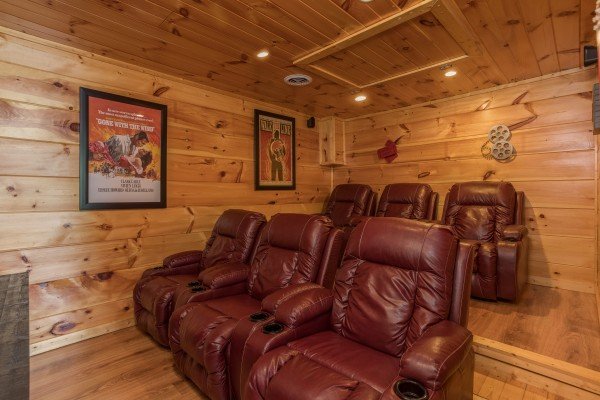 Large recliners in the theater room at Graceland, a 4-bedroom cabin rental located in Pigeon Forge