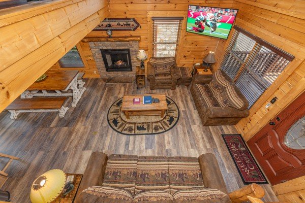 Loft view of living room  at Loving Every Minute, a 5 bedroom cabin rental located in Pigeon Forge