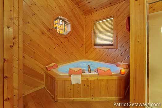 Jacuzzi tub in an attached bathroom at About Time, a 2 bedroom cabin rental located in Pigeon Forge