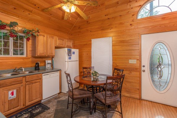 Dining space for four at Eastern Retreat, a 1-bedroom cabin rental located in Gatlinburg