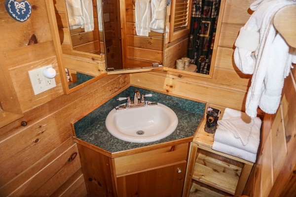 Bathroom vanity at Seclusion, a 1 bedroom cabin rental located in Gatlinburg