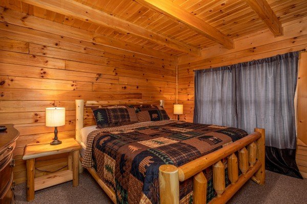 Master bedroom at Top of the Way, a 2 bedroom cabin rental located in Pigeon Forge