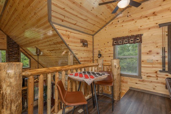 Checker game on a table at Alpine Adventure, a 4 bedroom cabin rental located in Pigeon Forge