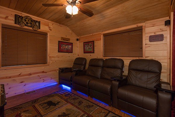 Theater room seating at Without A Paddle, a 3 bedroom cabin rental located in Gatlinburg