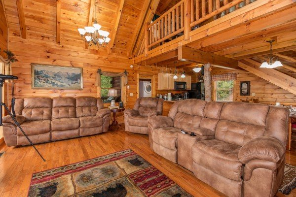 Sofas and recliner in the living room at Hummingbird's Views, a 1 bedroom cabin rental located in Pigeon Forge