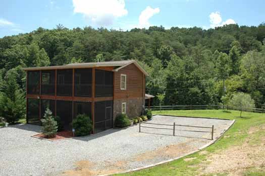 Gravel parking area at Heaven Sent, a 2-bedroom cabin rental located in Pigeon Forge