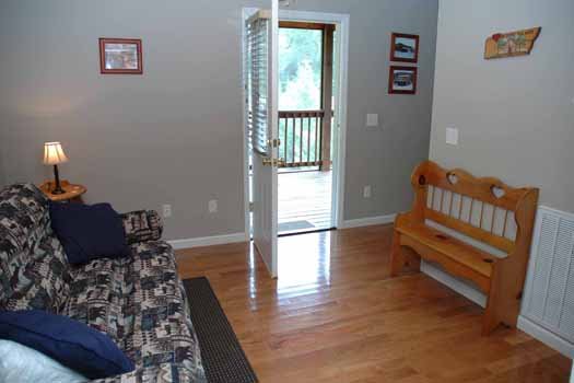 Screened deck access from second floor at Heaven Sent, a 2-bedroom cabin rental located in Pigeon Forge
