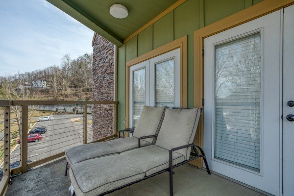 Chaise loungers on the balcony at Heart of Gatlinburg, a 2 bedroom cabin rental located in Gatlinburg