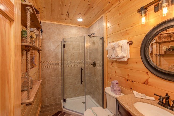 Bathroom with a glassed in shower at Out on a Limb, a 1 bedroom cabin rental located in Gatlinburg