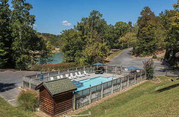 Resort pool area with lake views at Eagle's Nest, a 2-bedroom cabin rental located in Sevierville
