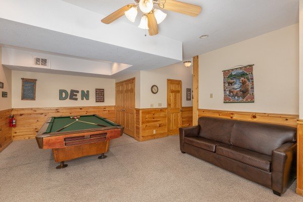 Game room with a sofa bed & pool table at Alpine Tranquility, a 4 bedroom cabin rental located in Pigeon Forge