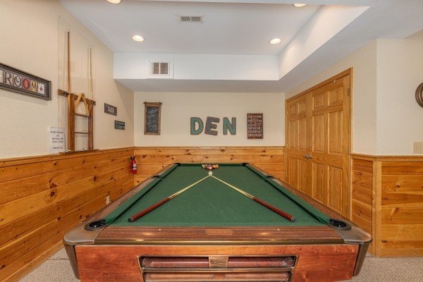 Green felted pool table at Alpine Tranquility, a 4 bedroom cabin rental located in Pigeon Forge
