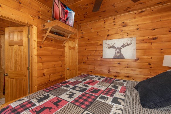 TV in a bedroom at 1 Awesome View, a 3 bedroom cabin rental located in Pigeon Forge