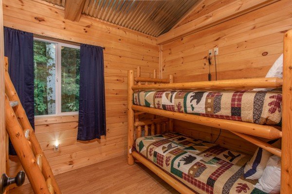 Two sets of twin bunks in a bedroom at License to Chill, a 3 bedroom cabin rental located in Gatlinburg