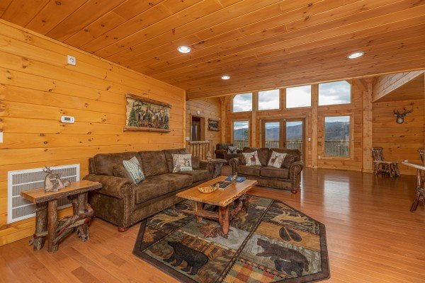 Sofa, loveseat, and coffee table at J's Hideaway, a 4 bedroom cabin rental located in Pigeon Forge