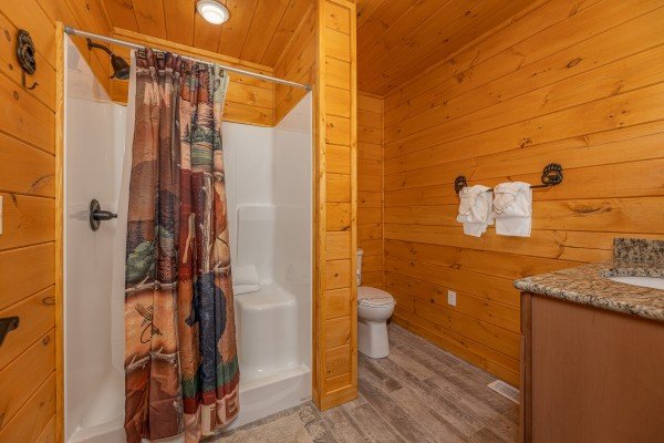 Bathroom with a walk in shower at J's Hideaway, a 4 bedroom cabin rental located in Pigeon Forge