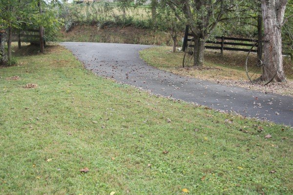 Driveway and yard at Leconte Nirvana, a 3 bedroom cabin rental located in Pigeon Forge