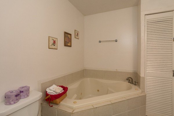 Jacuzzi in the bathroom at Bear it All, a 2-bedroom cabin rental located in Sevierville
