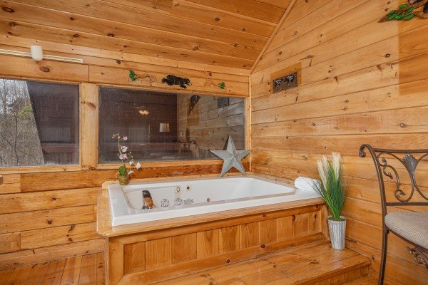 Jacuzzi at Smoky Mountain High, a 1 bedroom cabin rental located in Pigeon Forge