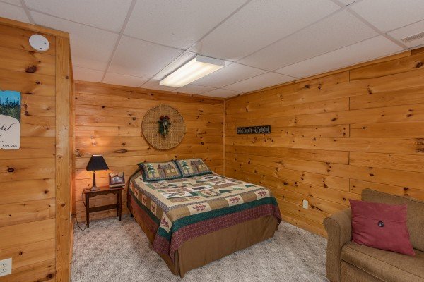 Bedroom with a queen bed at A View for You, a 1 bedroom cabin rental located in Pigeon Forge