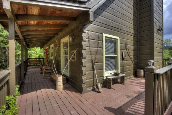Side porch at Wonders in the Sky, a 3 bedroom cabin rental located in Gatlinburg