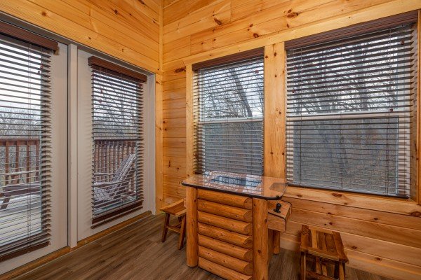 Arcade table at Mountain Pool & Paradise, a 3 bedroom cabin rental located in Pigeon Forge