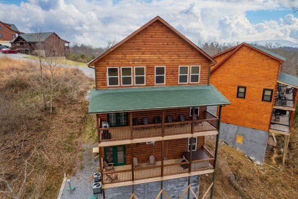 Exterior back view at Mountain Pool & Paradise, a 3 bedroom cabin rental located in Pigeon Forge