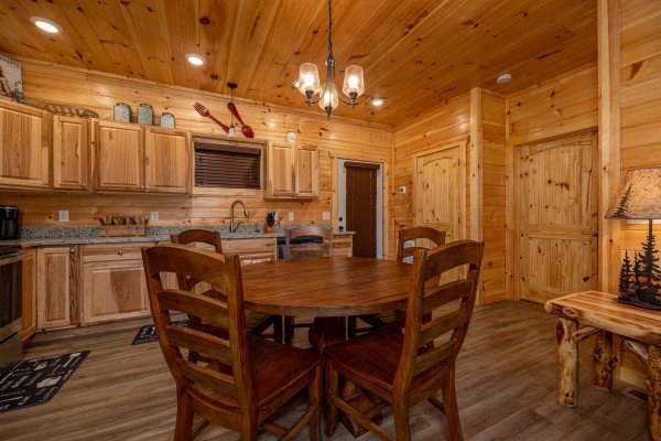 Kitchen table at Mountain Pool & Paradise, a 3 bedroom cabin rental located in Pigeon Forge