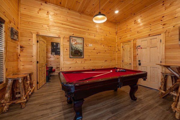 Pool table at Mountain Pool & Paradise, a 3 bedroom cabin rental located in Pigeon Forge