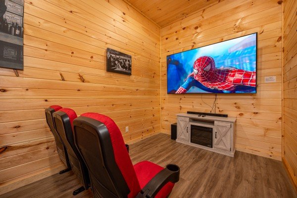 Theater flat screen at Mountain Pool & Paradise, a 3 bedroom cabin rental located in Pigeon Forge