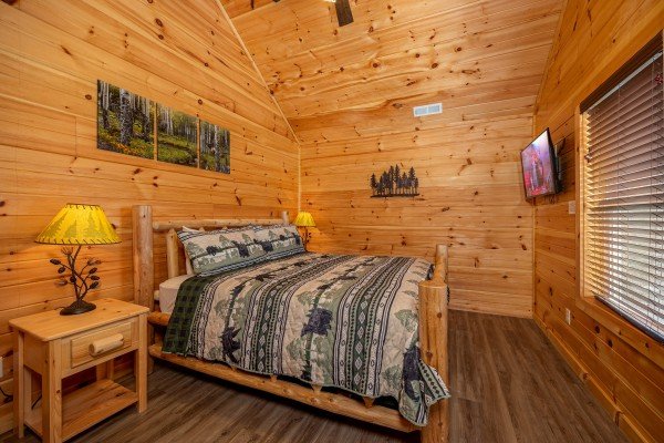 Bedroom at Mountain Pool & Paradise, a 3 bedroom cabin rental located in Pigeon Forge