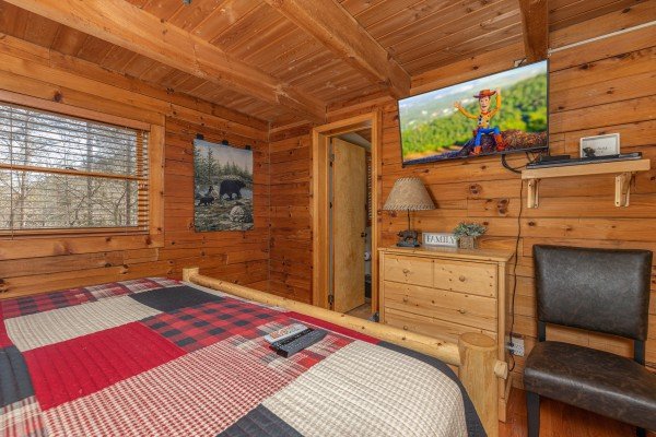 Dresser and TV at Snuggle Inn, a 2 bedroom cabin rental located in Pigeon Forge