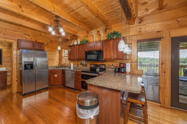 Kitchen appliances and breakfast bar at Smokies Serenity, a 2 bedroom cabin rental located in Douglas Lake