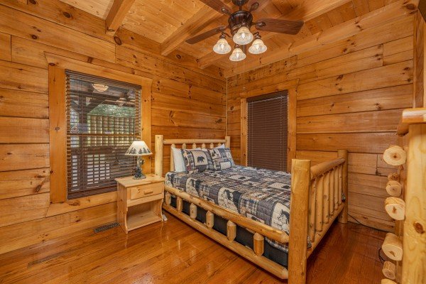Main floor bedroom with queen bed at Smokies Serenity, a 2 bedroom cabin rental located in Douglas Lake