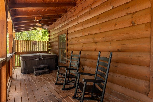 Seating and hot tub at Smokies Serenity, a 2 bedroom cabin rental located in Douglas Lake